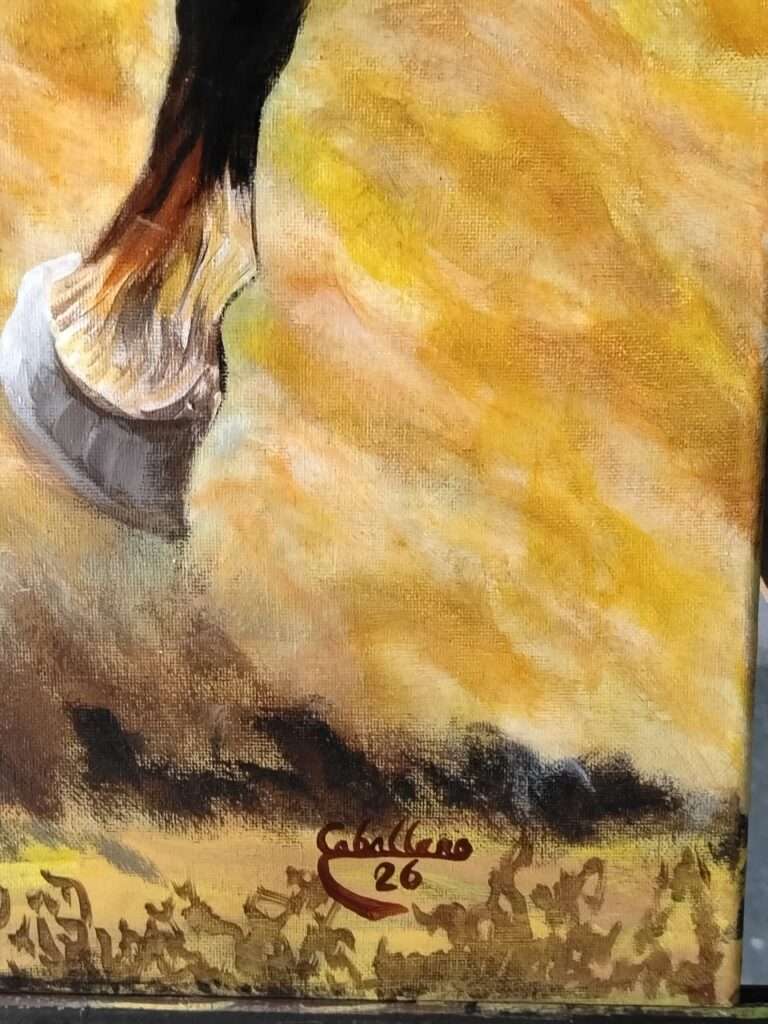 Close-up of the bottom corner of an acrylic painting on canvas. The image shows a horse's hoof and leg in motion against a vibrant background of ochre and yellow tones. In the lower-right corner, the artist's signature "Caballero" is featured in dark brown cursive, accompanied by the number "26."